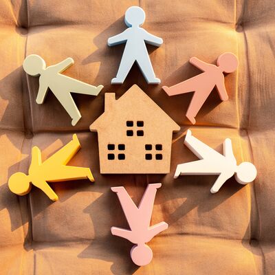 Model,Of,A,Wooden,House,And,A,Model,Of,People