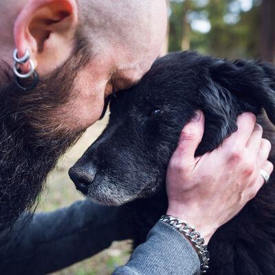 Man,Embracing,His,Old,Sick,Dog.,Man,Saying,Goodbuy,To
